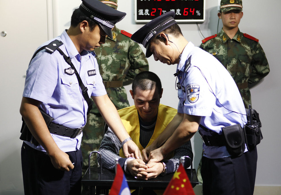 老挝警方来华提审湄公河案主犯糯康